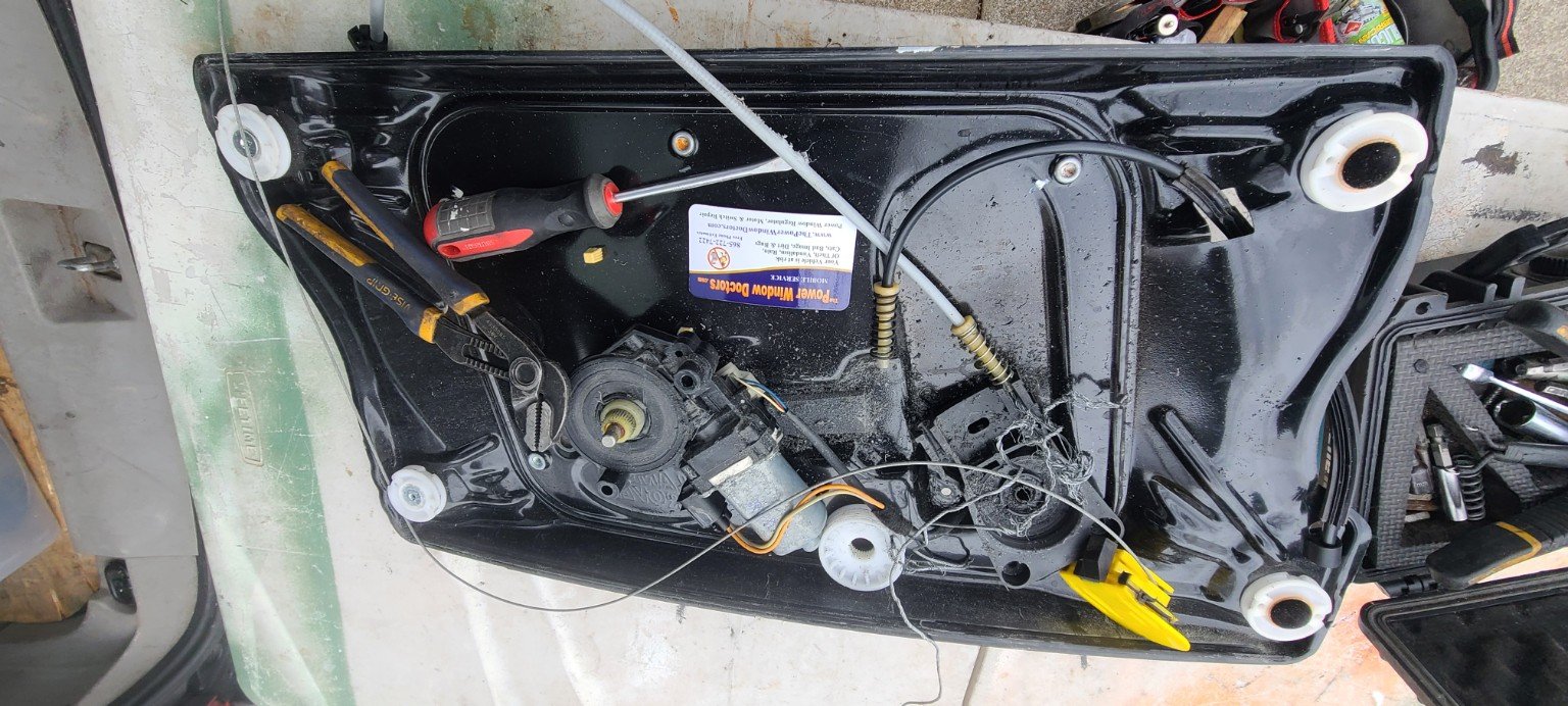 Exposed power window regulator mechanism